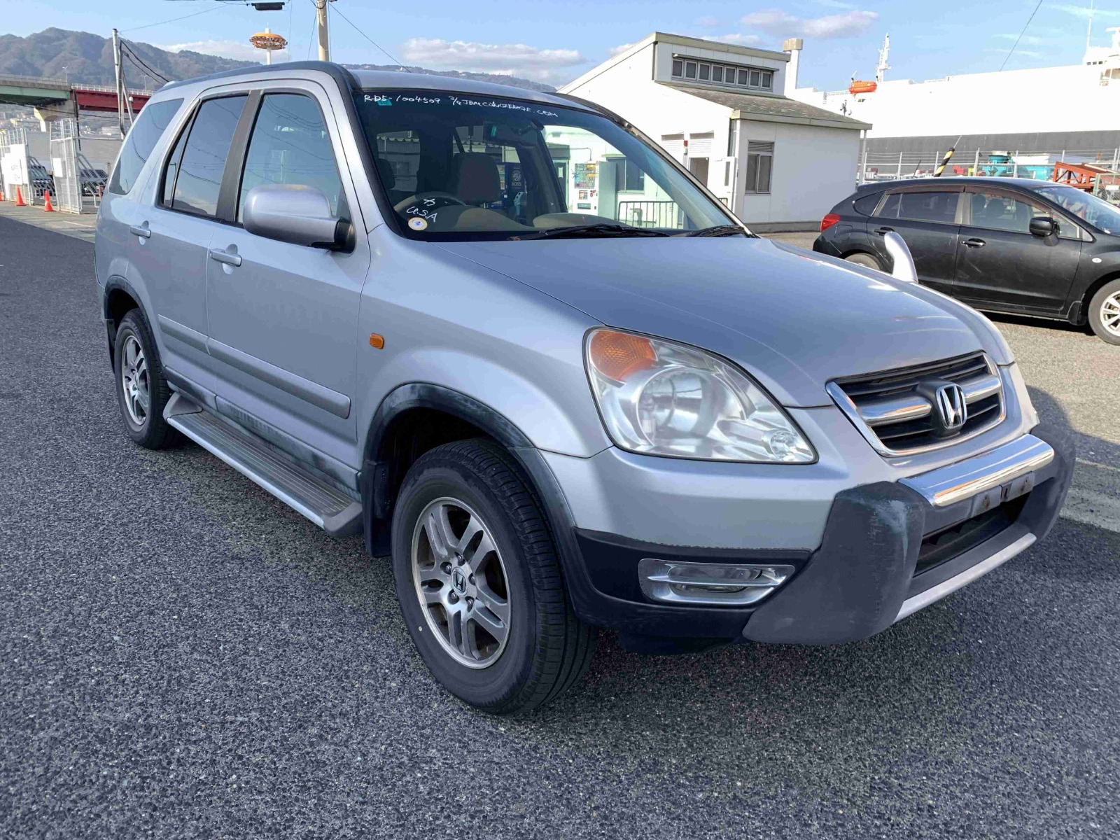 2001 Honda CR-V RHD — Silver: opposite front exterior