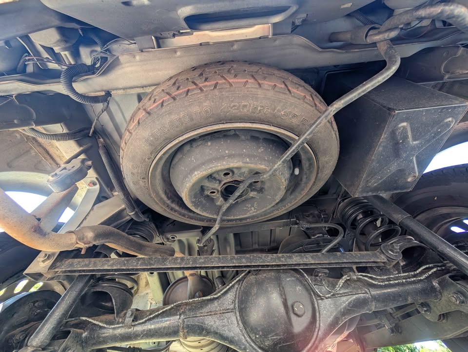 1997 Mitsubishi Bravo Exceed 4WD: rear underside and spare tire